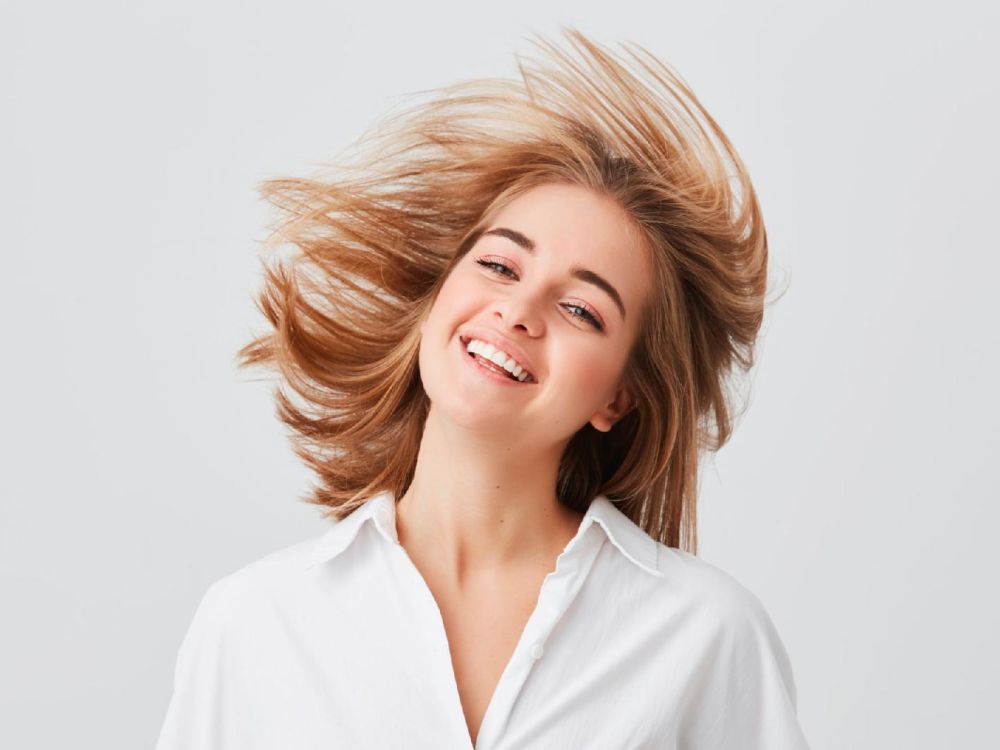 Et flot smil kan give selvtilliden et boost